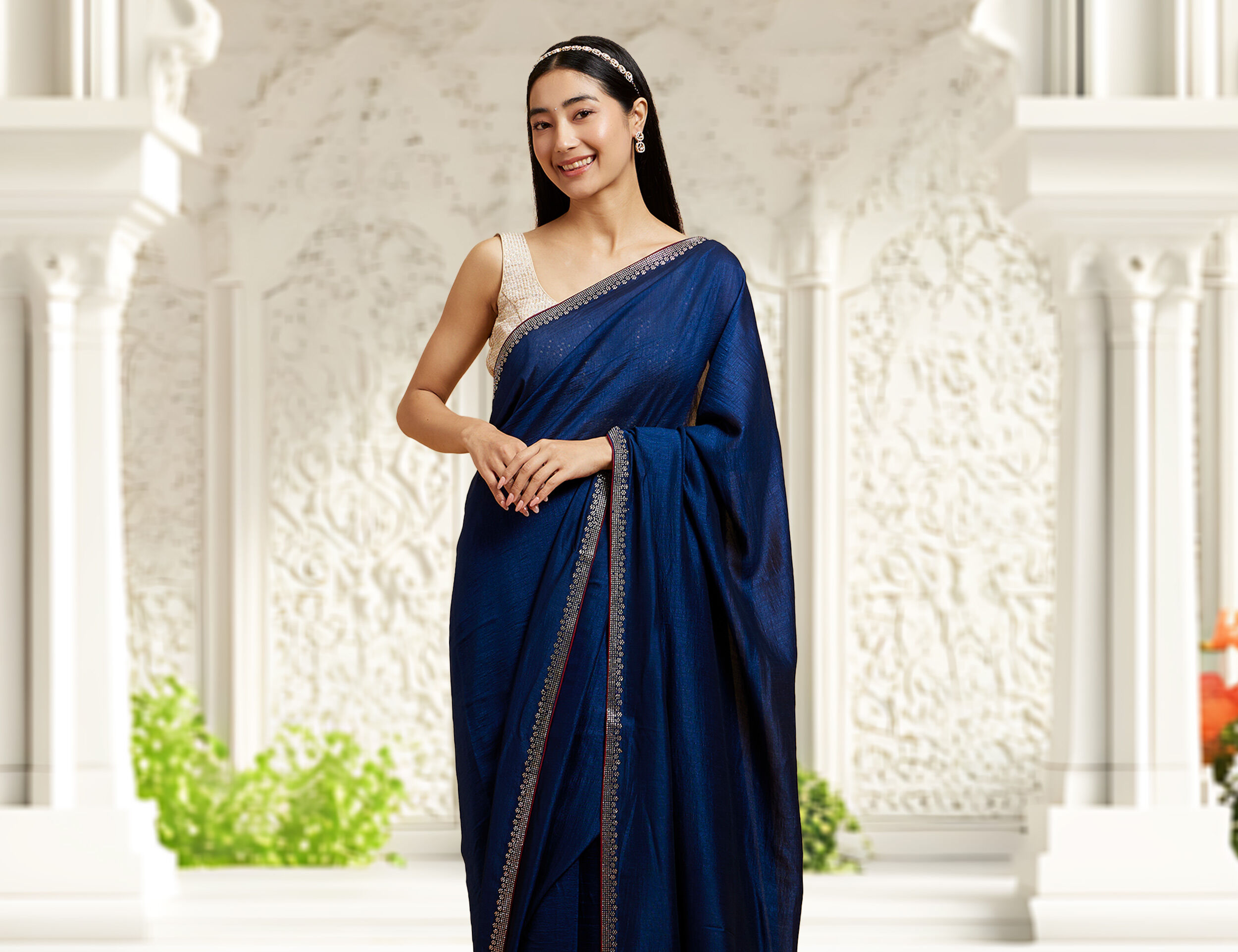 women flaunting her Teal Blue Rhinestone Embellished Saree
